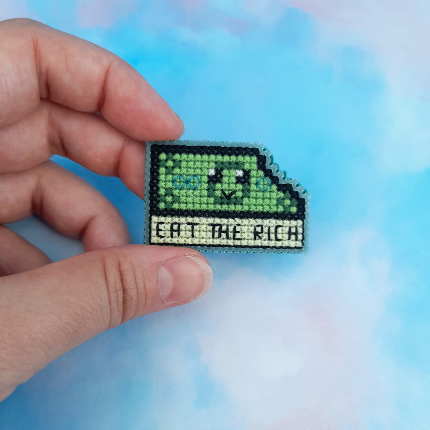 Eat the Rich - broche ou porte-clé